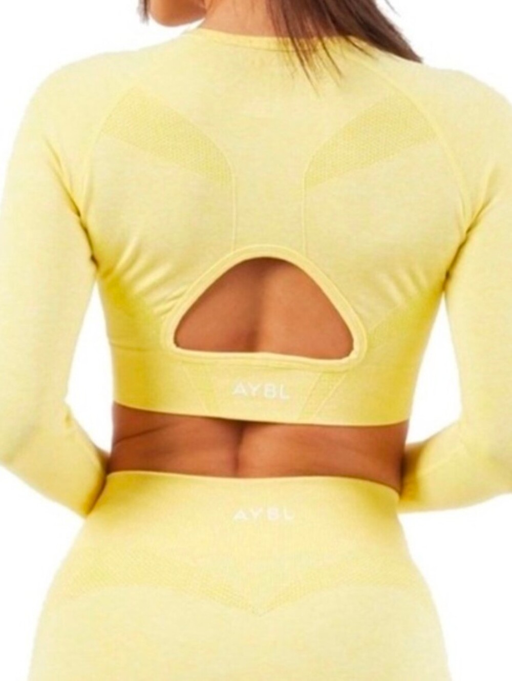 AYBL seamless long-sleeve crop top with a cutout back Yellow Size S